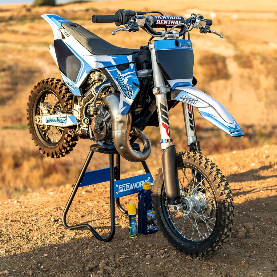 Front three-quarter view showing forks and exhaust